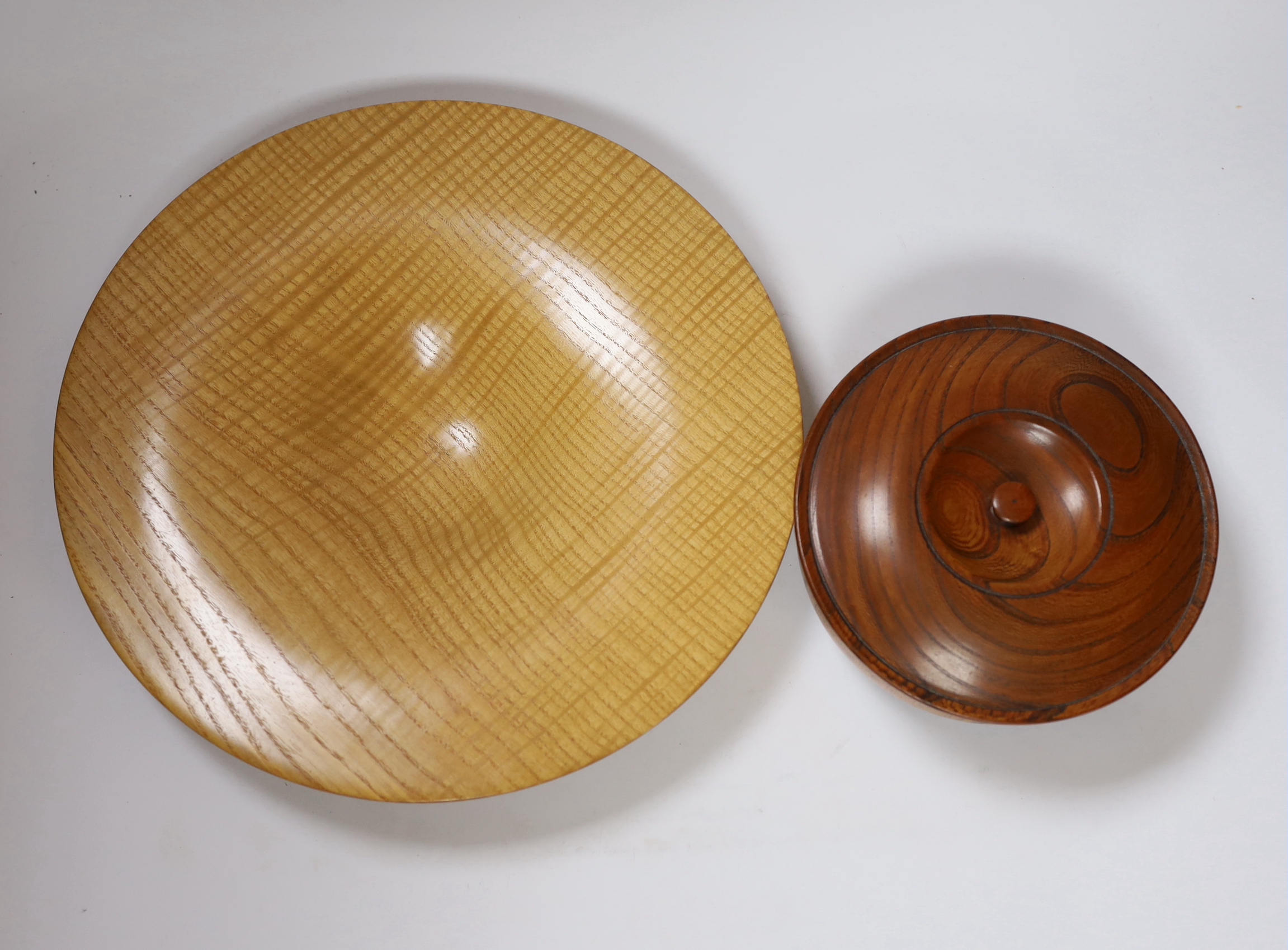 A contemporary Sussex Ash bowl, together with an elm bowl and cover, largest 32cm diameter